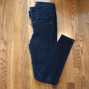 Black high waisted triple button jeans